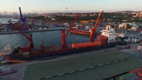 Container cargo ship at industrial port harbor in import export commercial trade Stock Footage 336445573