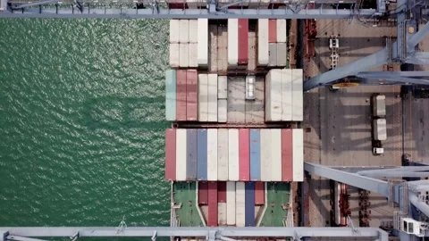 Container cargo ship at industrial port harbor in import export commercial trade Stock Footage 336445887