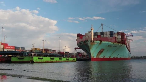 Container cargo ship load in the seaport. Stock Footage 130212047