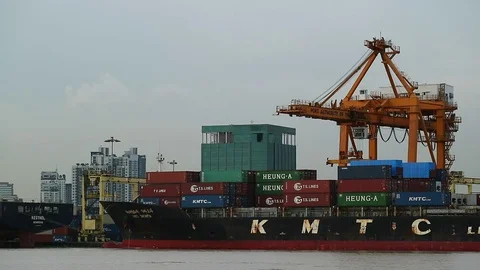 Container cargo ship loading by crane at shipping port Stockbeeldmateriaal 80899475