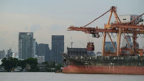 Container cargo ship loading by crane at shipping port Stock Footage 80899509