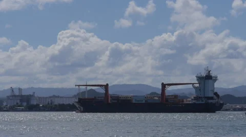 Container cargo ship vessel arriving to commercial docks Stock Footage 45519823