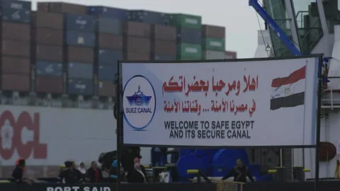 Container cargo ships passing through the Suez Canal in Greece. Stock Footage 249582757