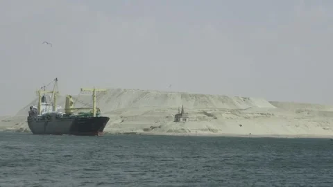 Container cargo ships passing through the Suez Canal in Greece. Stock Footage 249582784