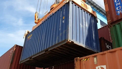 Container crane lift blue container at port   Stock Footage 120344863