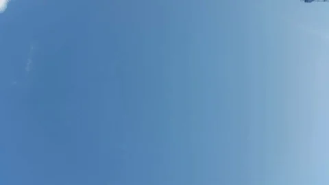 Container crane unloading container - bottom view  Stock Footage 88850534