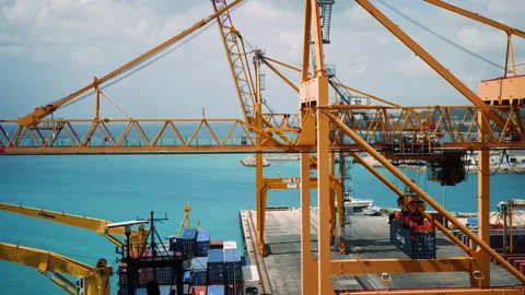 Container crane work at the cargo yard. Container Port Docks Ship Stock Footage 197576532