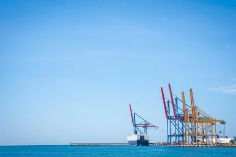Container cranes background with copy space. Stock Photos