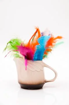 Container with feathers Stock Photos