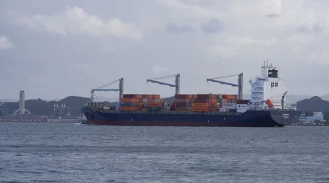 Container freighter cargo ship in harbor Stock Footage 59870214