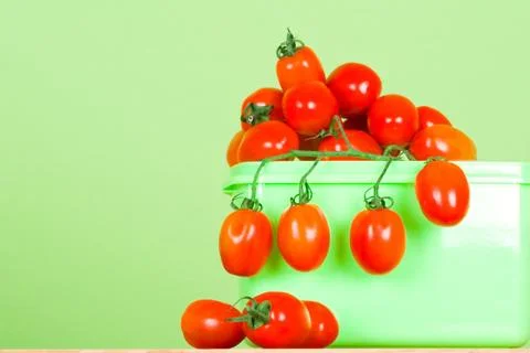 Container with fresh tomatoes Stock Photos