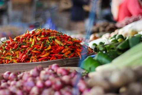 A container full of chilies Stock Photos