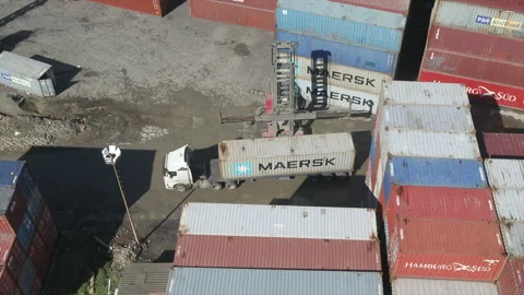 A container handler forklift loading a s... | Stock Video | Pond5