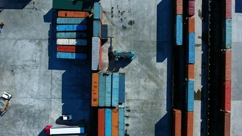 Container Handler loading move  at a freight terminal. Aerial view 4k Stockbeeldmateriaal 97532493