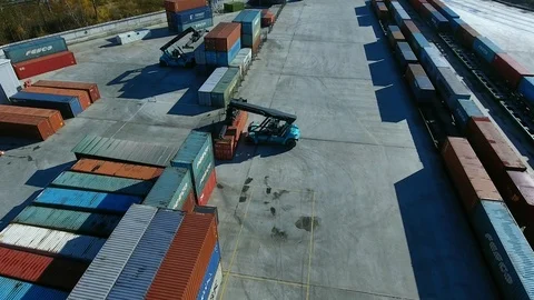 Container Handler loading move at a freight terminal. Aerial view 4k Stock-Footage 97532654