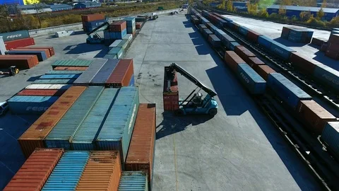 Container Handler loading move at a freight terminal. Aerial view 4k Video stock 97533115