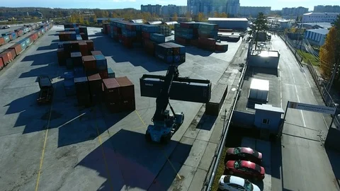 Container Handler loading move at a freight terminal. Aerial view 4k Stock-Footage 97533236