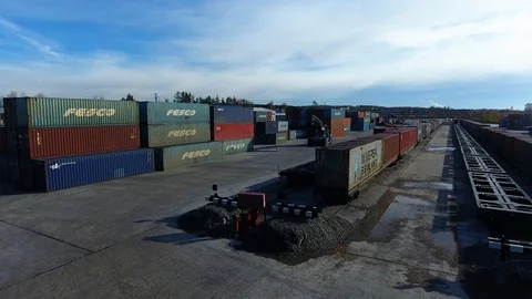 Container Handler loading move at a freight terminal. Aerial view 4k Stock-Footage 97533273