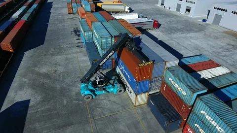 Container Handler loading move at a freight terminal. Aerial view 4k Video stock 97533402