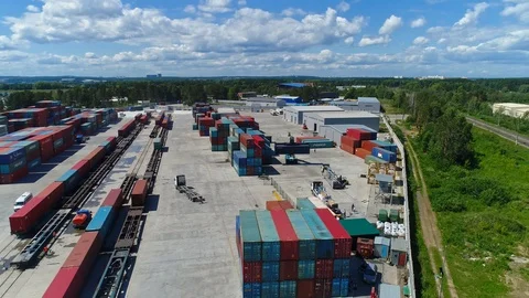 Container Handler Loading a Truck in the Terminal. UHD. 4K. Aerial view 스톡 동영상 123283575