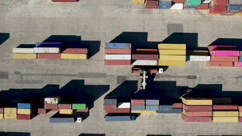Container Handler unloading a Truck in Port Terminal. Video stock 222037701