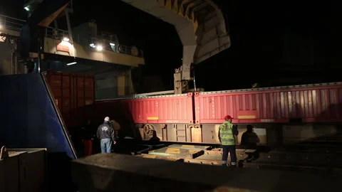 Container-laden train unloaded from the ship. Video stock 149022781