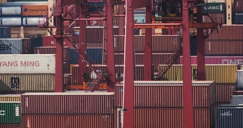 Container loading in a Cargo freight ship with industrial crane. Container Stock Footage 123098044
