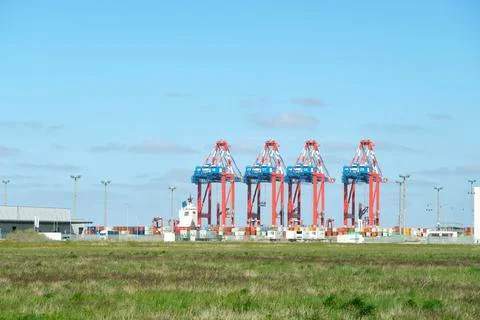 Container loading cranes at the industrial Jade Weser deep water port Stock Photos