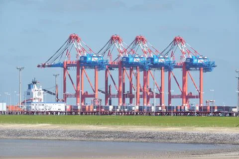 Container loading cranes in the Jade Weser cargo port, Germany Stock Photos