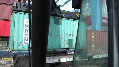 Container loading operations at a busy port in daylight Video stock 318203126