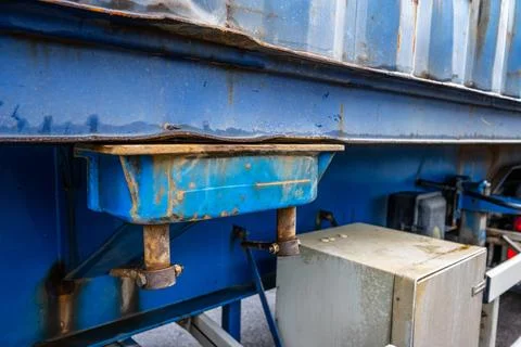 Container locking pin on a blue trailer Stock Photos