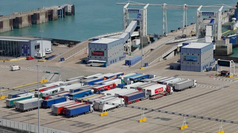 Container lorries boarding a ship at the Port of Dover Stock Footage 30635870