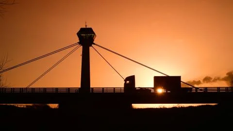 Container lorry crossing the river Ouse across Selby swing bridge uk Stock Photos