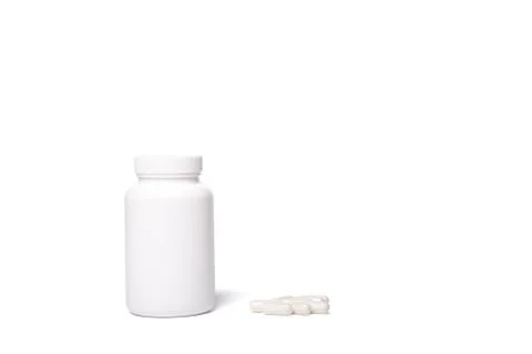 Container with no logo, with capsules isolated on a white. Stock Photos