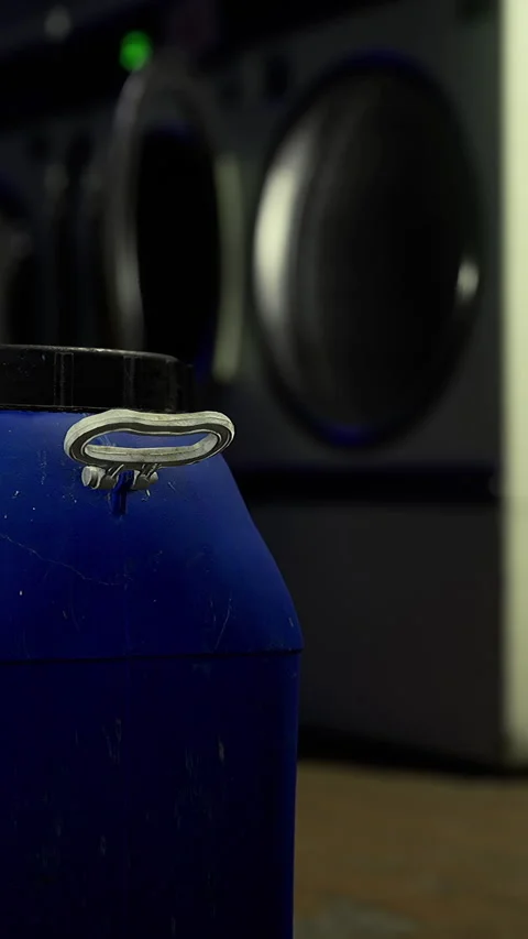 Container is placed on a table with sound equipment in the background Stock Footage 331679944