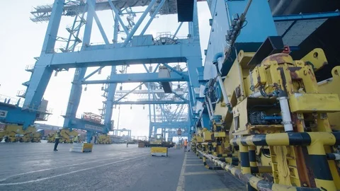 A container is placed on a truck in the harbor Stock Footage 118758527