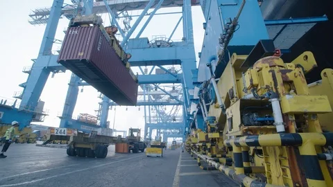 A container is placed on a truck in the port Stock Footage 118759892