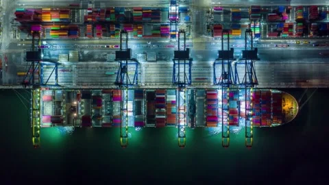 Container port terminal facility in night light import export business finance Stock-Footage 336270140