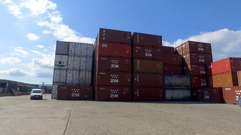 Container port terminal, working trucks, reachstacker, loading containers Video stock 128175609