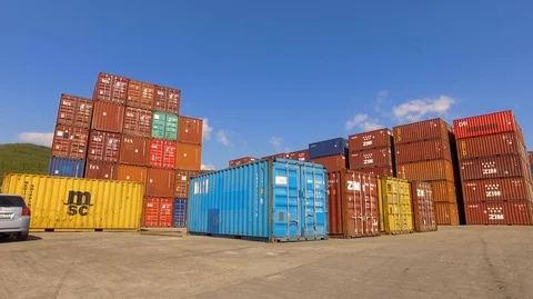 Container port terminal, working trucks, reachstacker, loading containers Video stock 128176268