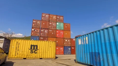 Container port terminal, working trucks, reachstacker, loading containers Video stock 128176296