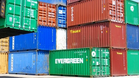 Container reach stacker is lifting 20' container 4k intro video for business Stock Footage 92141712