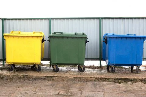 Container for separate garbage collection. Close up photo of three recycle bi Stock Photos