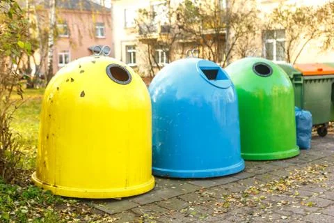 Container for separate garbage collection. Urban landscape Stock Photos