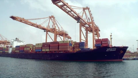 Container ship and cranes in a container port in Oman. Stock Footage 90217168