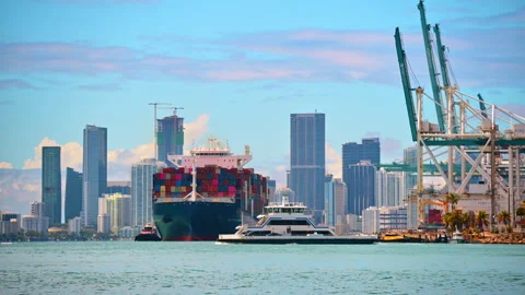 Container ship and ferry boat in Miami harbor Stock Footage 334933231