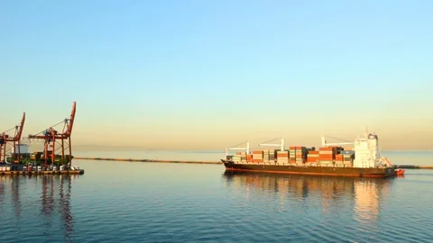 Container ship approaches the pier Stock Footage 79362937
