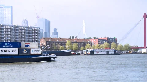Container ship approaches red bridge - Rotterdam Video stock 33520599