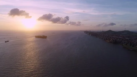 Container ship arrive Shanghai Yangshan container port in sunset.China Stock Footage 94437870