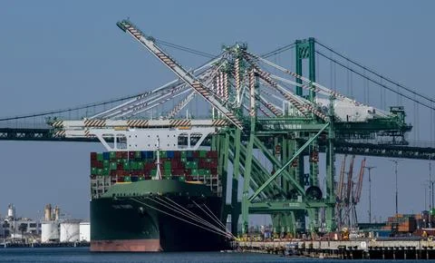 Container ship bow with containers, loading cranes, bridge Port of Los Angeles  Stock Photos